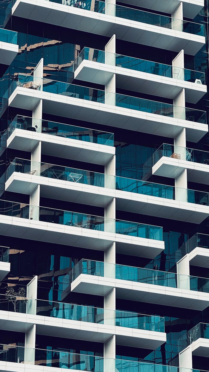 Close-up view of a residential building's geometric facade in Dubai, UAE, showcasing modern architecture.